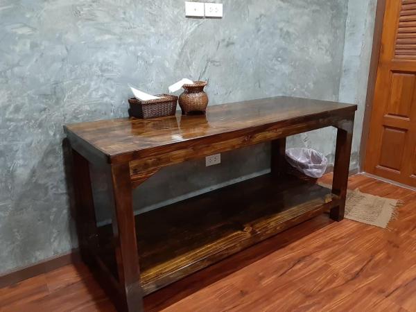 เฮือนไม้ชมนาด Huanmaichommanard : photo 4 de la chambre chambre lits jumeaux