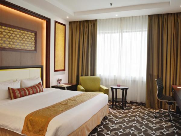 Corus Hotel Kuala Lumpur : photo 1 de la chambre chambre exécutive deluxe avec lit king-size