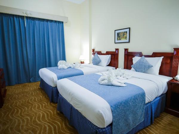 Green House Hotel Suites & Apartment : photo 8 de la chambre chambre deluxe double ou lits jumeaux