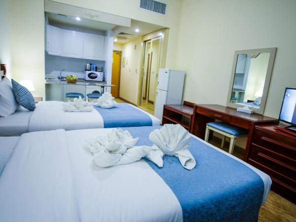 Green House Hotel Suites & Apartment : photo 6 de la chambre chambre deluxe double ou lits jumeaux