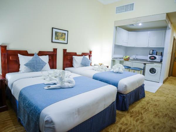 Green House Hotel Suites & Apartment : photo 5 de la chambre chambre deluxe double ou lits jumeaux