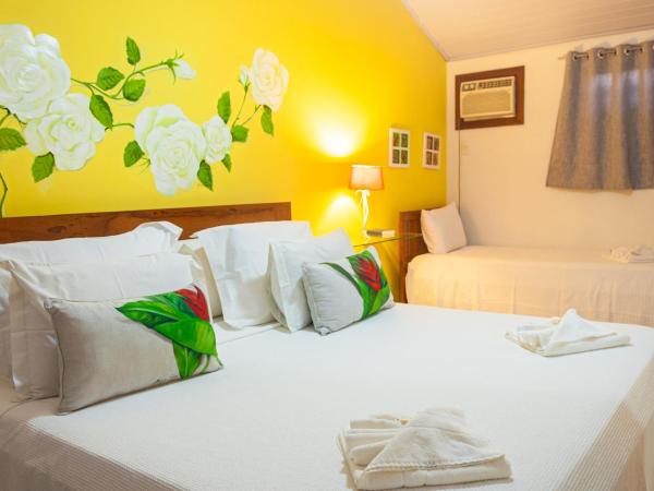 Pousada Praia e Conforto : photo 2 de la chambre chambre triple supérieure