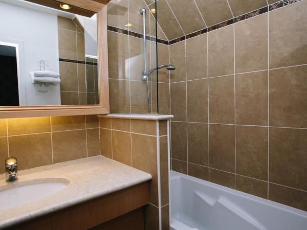 Le Relais Du Roy : photo 4 de la chambre chambre lits jumeaux supérieure avec baignoire