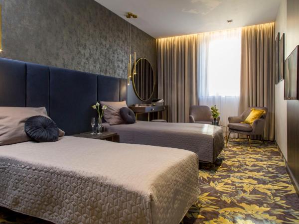 Hotel Atrium : photo 1 de la chambre chambre deluxe double ou lits jumeaux