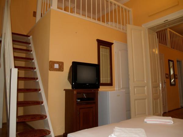 Péterfia Panzió : photo 2 de la chambre chambre quadruple en duplex