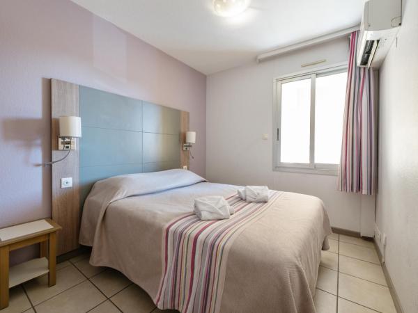Résidence Pierre & Vacances La Rostagne : photo 3 de la chambre appartement 1 chambre avec coin couchage dans alcôve et climatisation (6 personnes)