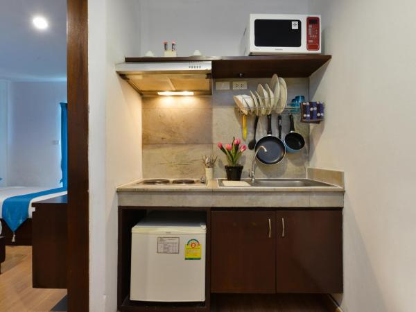 Arawana Express Chinatown : photo 2 de la chambre chambre lits jumeaux de luxe avec fenêtre