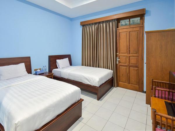 Sekar Ayu Hotel Malioboro Mitra RedDoorz : photo 3 de la chambre chambre lits jumeaux supérieure