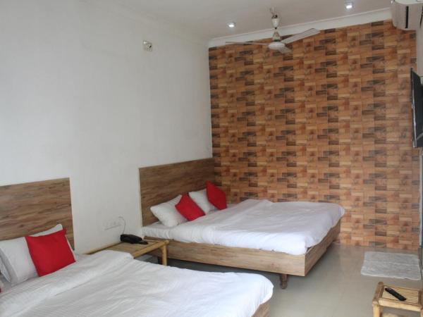 Hotel Heritage High : photo 2 de la chambre chambre deluxe avec 2 lits doubles