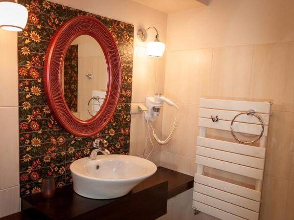 Apartamenty Siedem Komnat Siedmiu Mistrzów : photo 6 de la chambre chambre double ou lits jumeaux