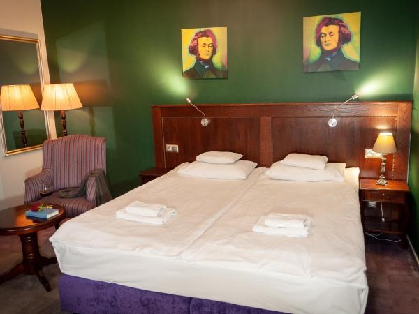 Apartamenty Siedem Komnat Siedmiu Mistrzów : photo 4 de la chambre chambre double ou lits jumeaux