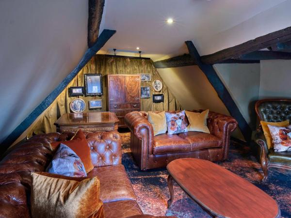 Guy Fawkes Inn : photo 1 de la chambre suite avec lit double