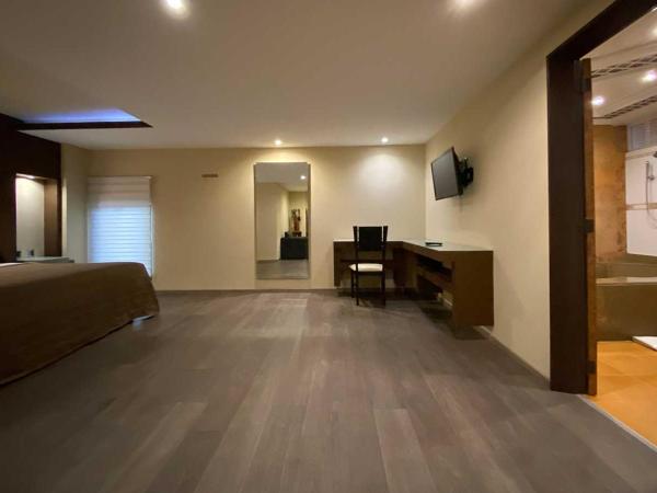 Hotel Escala Central del Norte : photo 7 de la chambre chambre lit queen-size avec baignoire spa