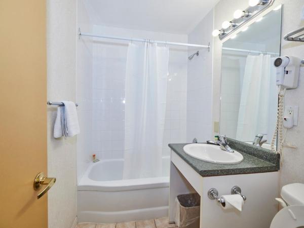 The Glengate Hotel & Suites : photo 1 de la chambre chambre lit queen-size 