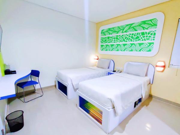 Cordex Hotel Ancol : photo 1 de la chambre chambre lits jumeaux deluxe