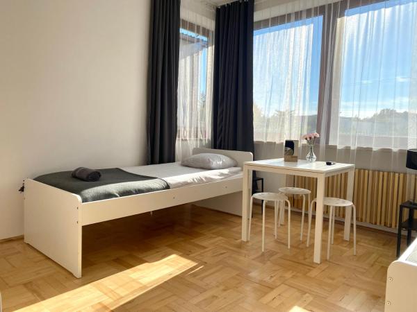 Pokoje Rezydencja Parysa : photo 6 de la chambre chambre triple avec salle de bains commune