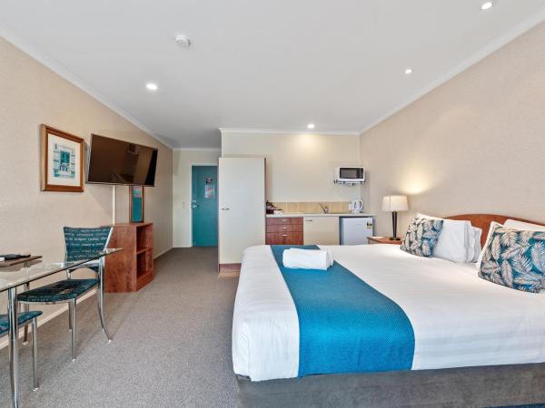 Aristotles North Shore : photo 2 de la chambre chambre lit king-size accessible aux personnes à mobilité réduite