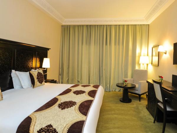 DWO Marrakech Ennakhil : photo 10 de la chambre chambre double ou lits jumeaux - vue sur piscine