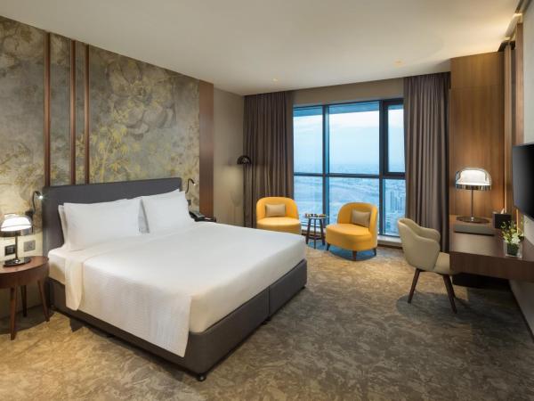 Millennium Place Barsha Heights Hotel : photo 2 de la chambre chambre lit king-size deluxe