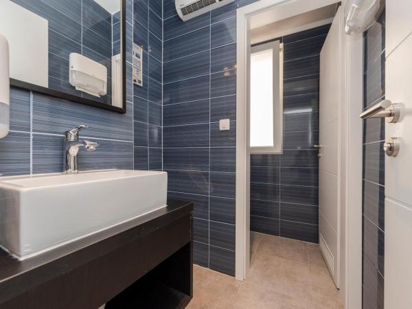 Downtown Boutique Hostel : photo 5 de la chambre lit dans dortoir mixte de 4 lits