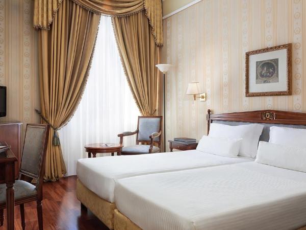 Sina De La Ville : photo 2 de la chambre chambre double ou lits jumeaux avec lit d'appoint