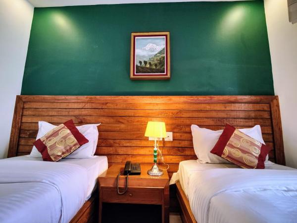 Hotel Tulsi : photo 4 de la chambre chambre deluxe double ou lits jumeaux