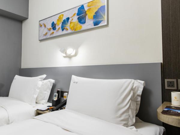 City Inn Macau : photo 3 de la chambre chambre deluxe double ou lits jumeaux