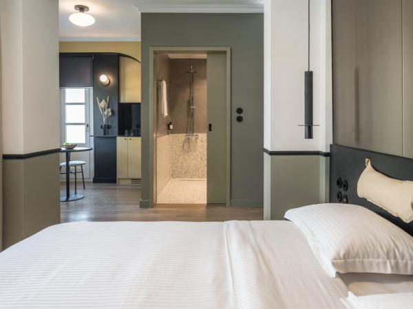 72 AD Suites : photo 1 de la chambre chambre confortable