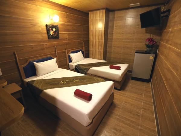 Thai Cozy House - SHA certified : photo 1 de la chambre chambre lits jumeaux standard