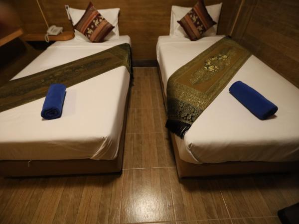 Thai Cozy House - SHA certified : photo 2 de la chambre chambre lits jumeaux standard