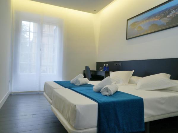 Loaldia : photo 1 de la chambre chambre double ou lits jumeaux avec balcon