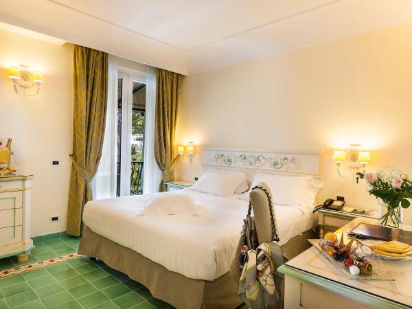 Excelsior Belvedere Hotel & Spa : photo 1 de la chambre chambre double ou lits jumeaux supérieure - vue sur jardin