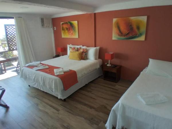 Pousada Vila do Sol : photo 2 de la chambre chambre triple - vue sur mer