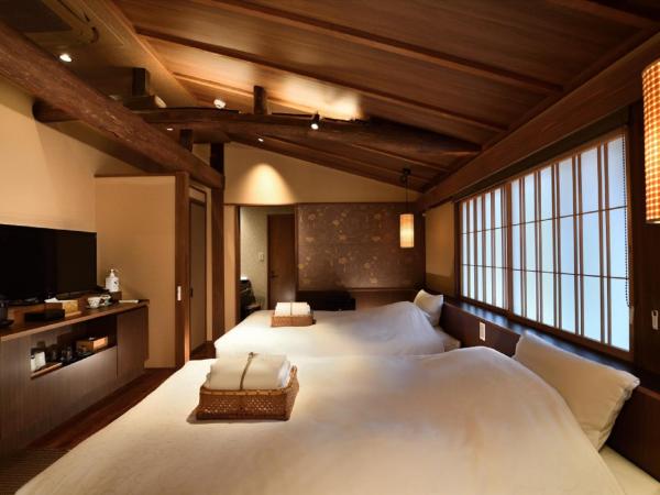 Muromachi Yutone Kyokoyado : photo 2 de la chambre chambre lits jumeaux avec salle de bains privative - fujimurasaki