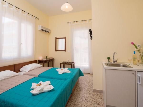 Penelopi Rooms : photo 2 de la chambre chambre lits jumeaux