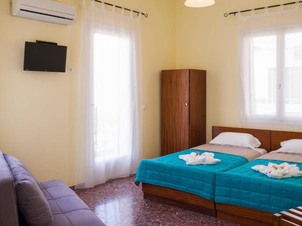 Penelopi Rooms : photo 9 de la chambre grande chambre double ou lits jumeaux