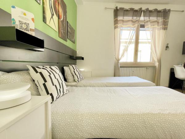 MilanHolidays : photo 6 de la chambre chambre double ou lits jumeaux avec salle de bains privative