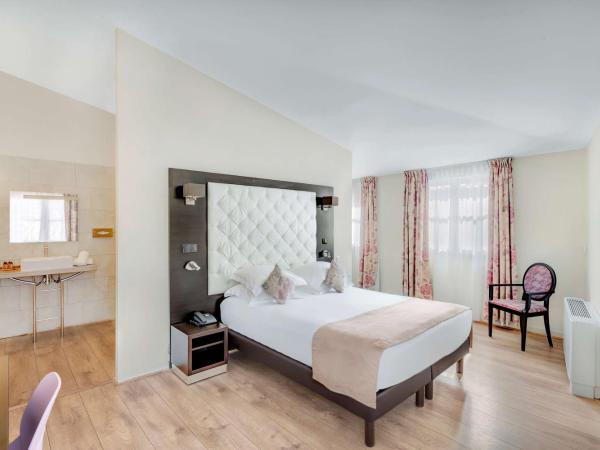 Best Western Marquis de la Baume : photo 1 de la chambre chambre lit queen-size prestige