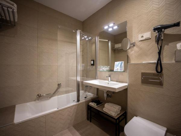 abba Sevilla : photo 2 de la chambre chambre deluxe double ou lits jumeaux