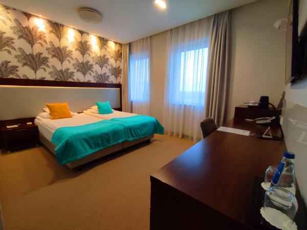 Hotel Zamek Centrum : photo 7 de la chambre chambre double ou lits jumeaux