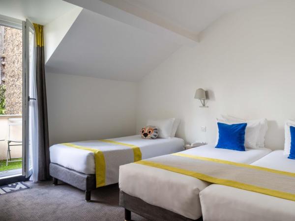 Hotel George - Astotel : photo 2 de la chambre chambre triple avec terrasse