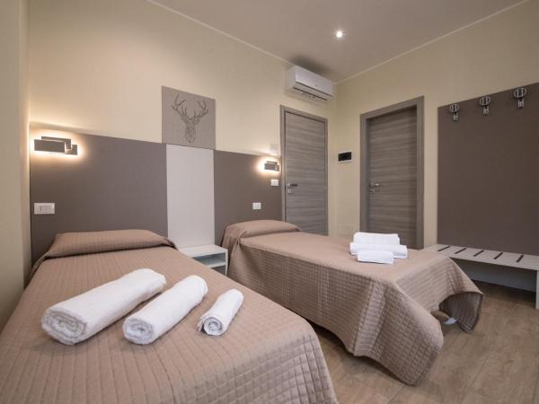 Le PALME : photo 3 de la chambre chambre lits jumeaux deluxe