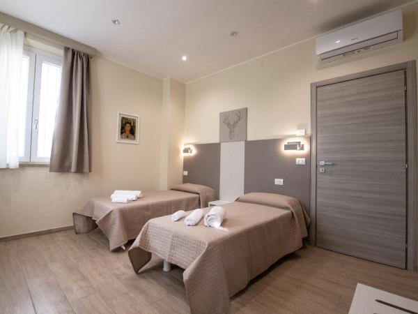 Le PALME : photo 1 de la chambre chambre lits jumeaux deluxe