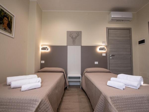 Le PALME : photo 2 de la chambre chambre lits jumeaux deluxe