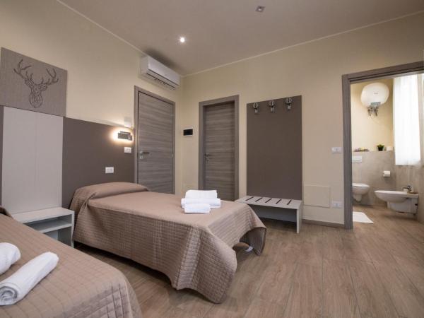 Le PALME : photo 4 de la chambre chambre lits jumeaux deluxe