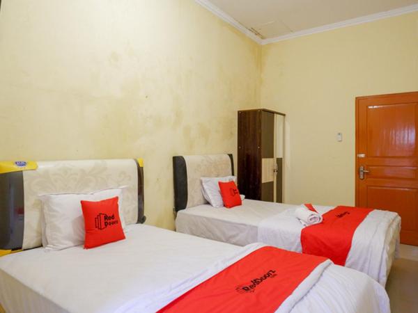 RedDoorz near Sleman City Hall 3 : photo 3 de la chambre chambre lits jumeaux