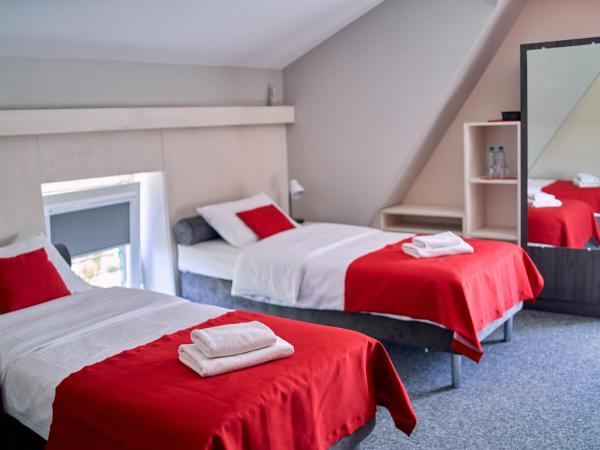 Hotel Przystanek Torun : photo 1 de la chambre chambre lits jumeaux