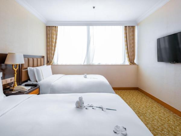 China Mayors Plaza - Free shuttle between hotel and Exhibition Center during Canton Fair : photo 1 de la chambre suite lits jumeaux de luxe 