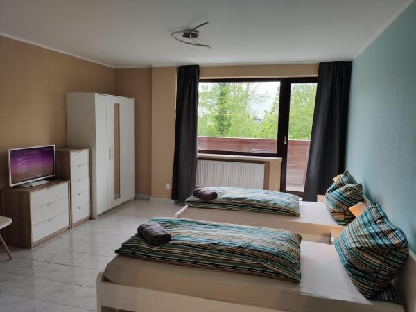 HOME at FRIENDS - City - Zu Hause bei Freunden : photo 1 de la chambre appartement en duplex