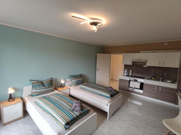 HOME at FRIENDS - City - Zu Hause bei Freunden : photo 8 de la chambre appartement en duplex